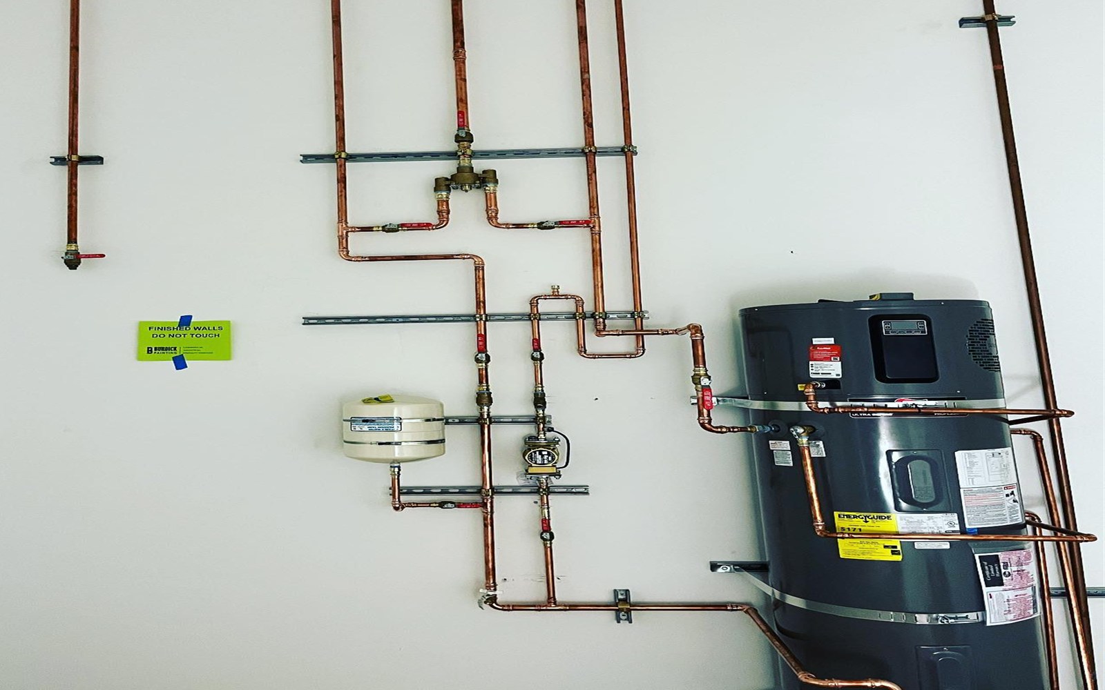 Large 80-gallon commercial water heater installed by Prime Time Plumbing