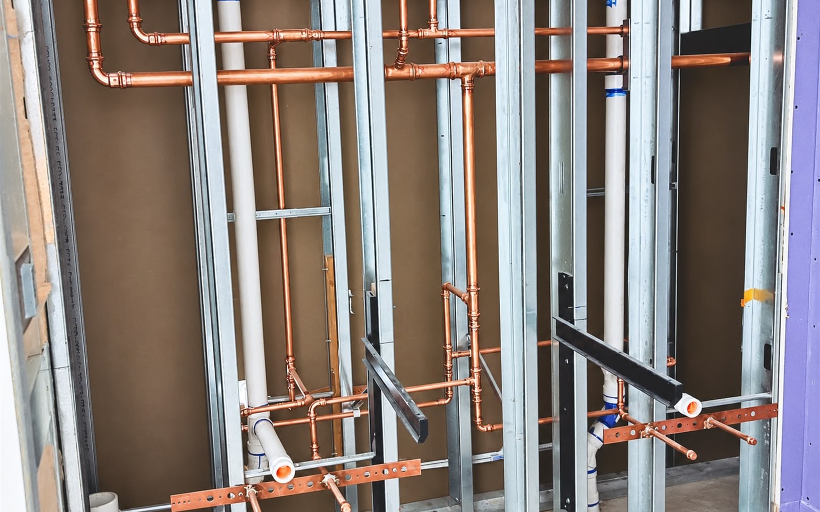 New construction copper and drain rough-in manifold by Prime Time Plumbing