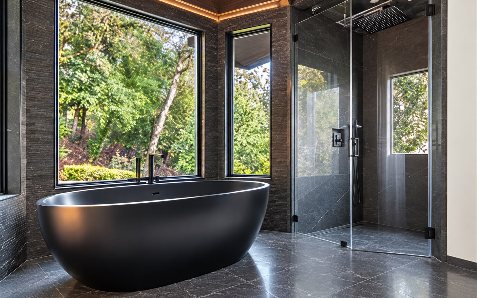 Finished bathroom with a dark freestanding tub and floor-to-ceiling windows