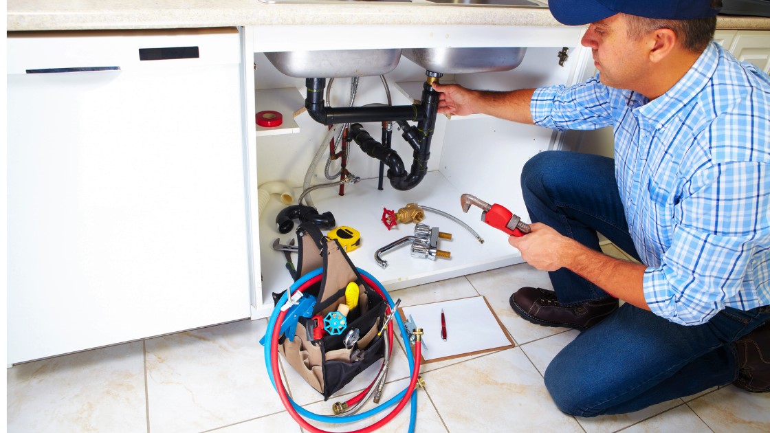Clean under-sink plumbing repair and trap installation